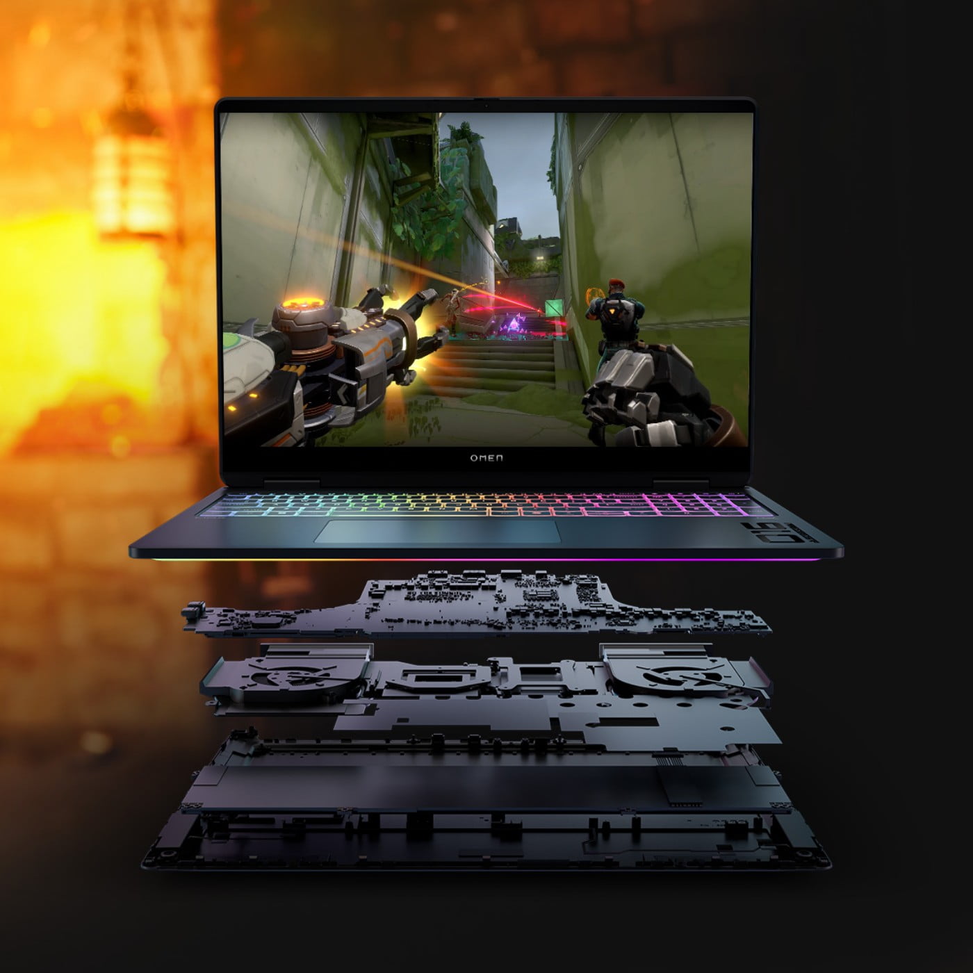 An exploded view of the OMEN MAX 16 with its internal layers stacked beneath a laptop running a game
