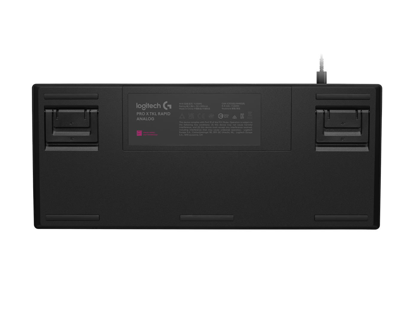 The PRO X TKL Rapid seen from the underside, with its two flip-out feet and cable exit at the back