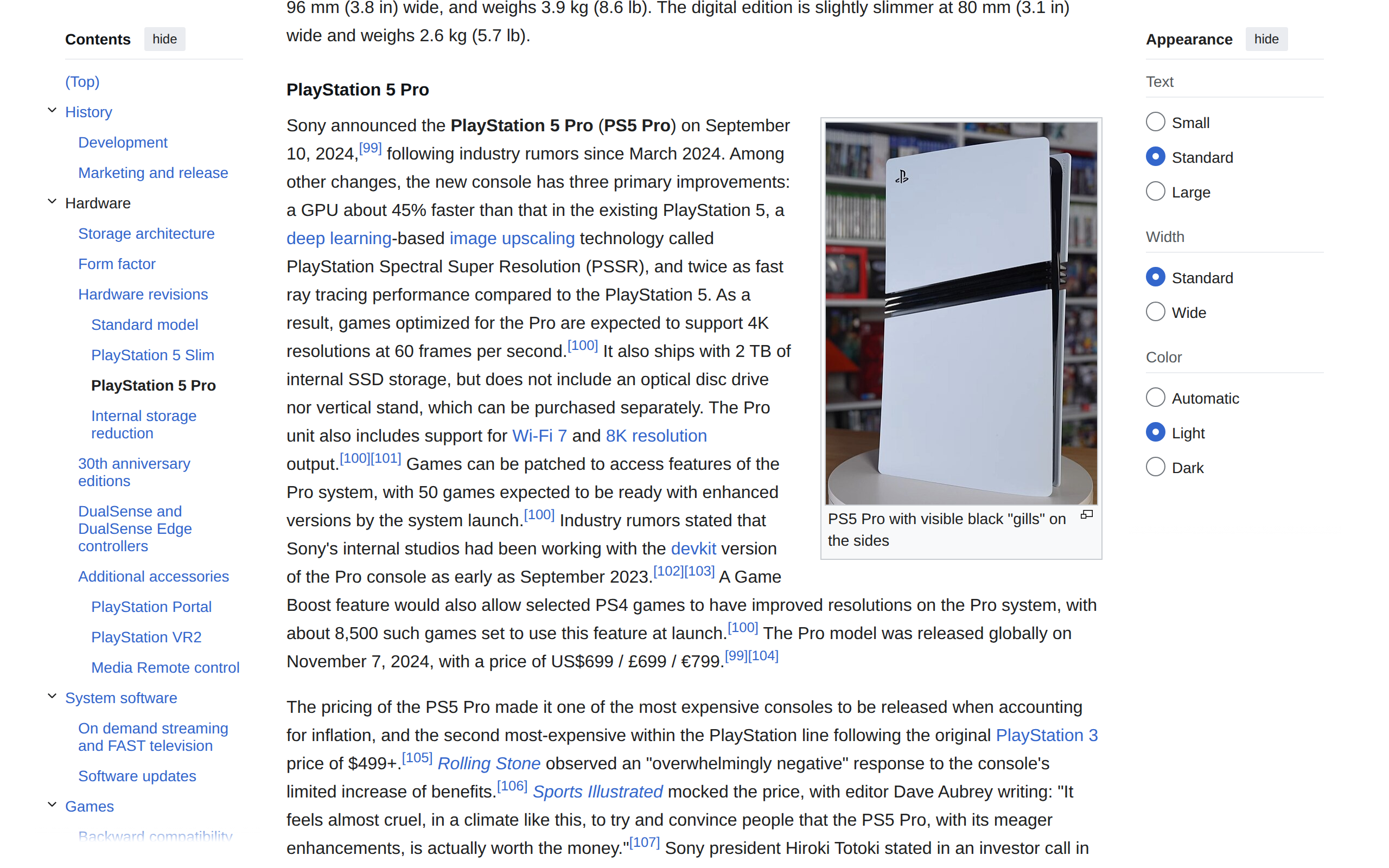 Wikipedia article on the PlayStation 5 Pro with a photo of a white and black console standing upright